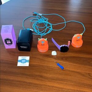 Purple TickTalk 5 Kids Smartwatch with 2 base chargers